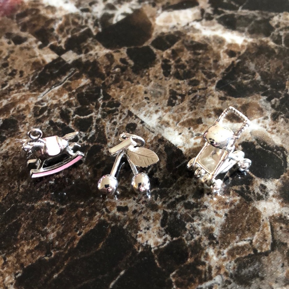 Three Sterling Silver Charms